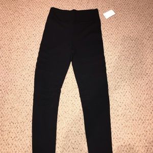 Brand new black leggings with mesh slits